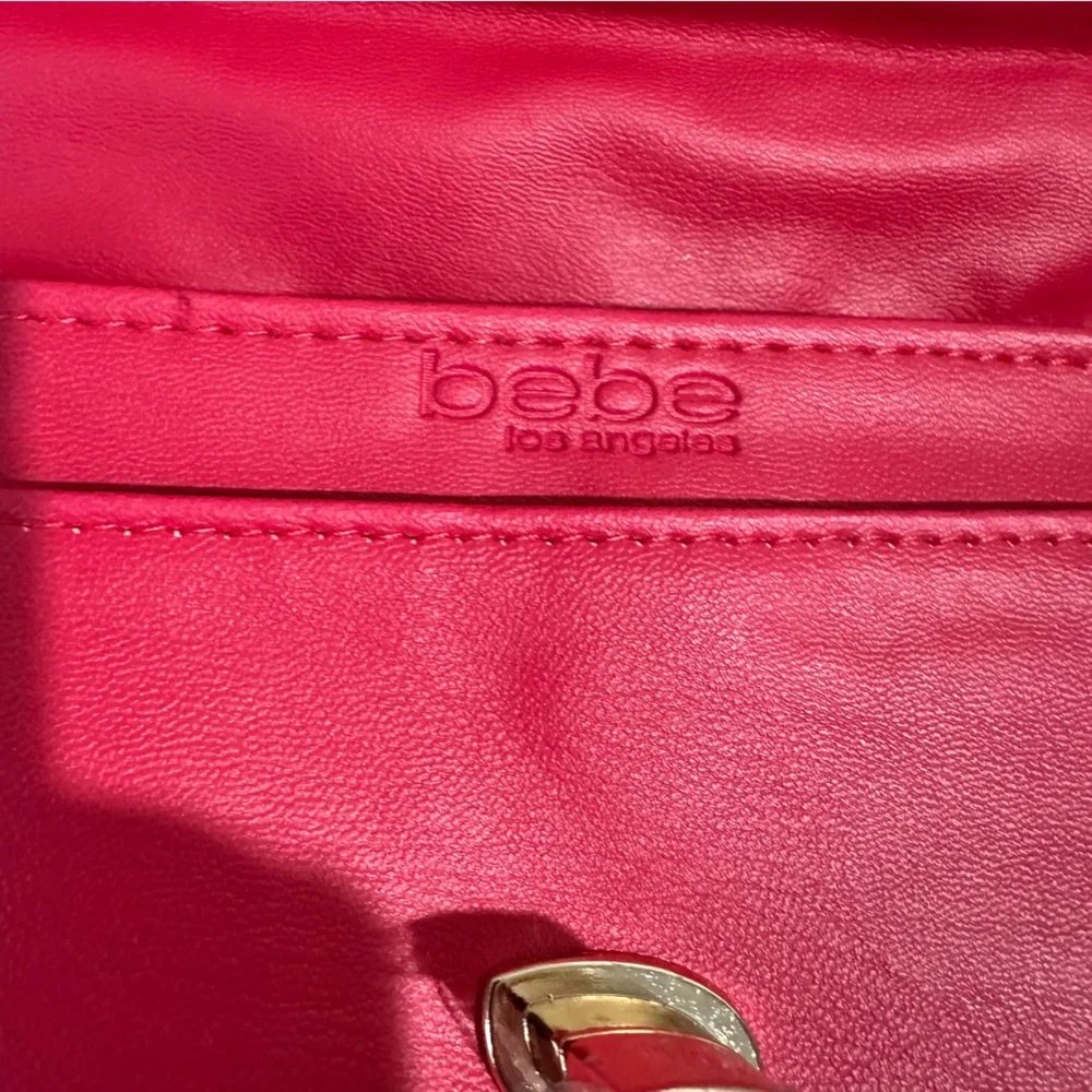 bebe Liv Monogram Crossbody bag in Bright Pink/Dark Pink Logo gold hardware